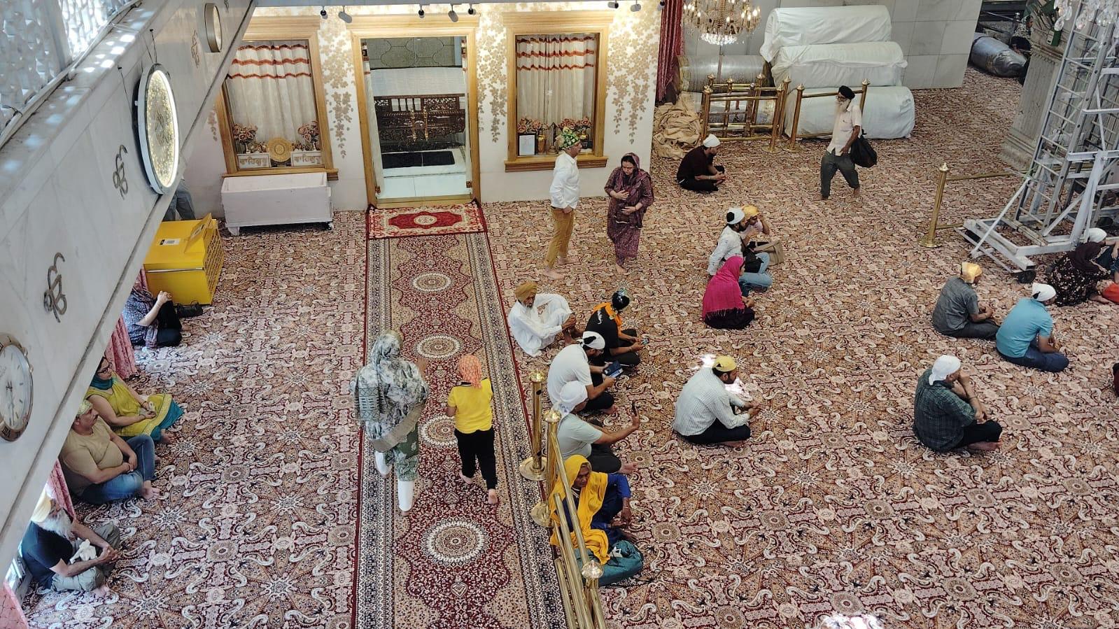 Dargah Interior Red Floral Carpet With Devotees MR Enterprises Panipat