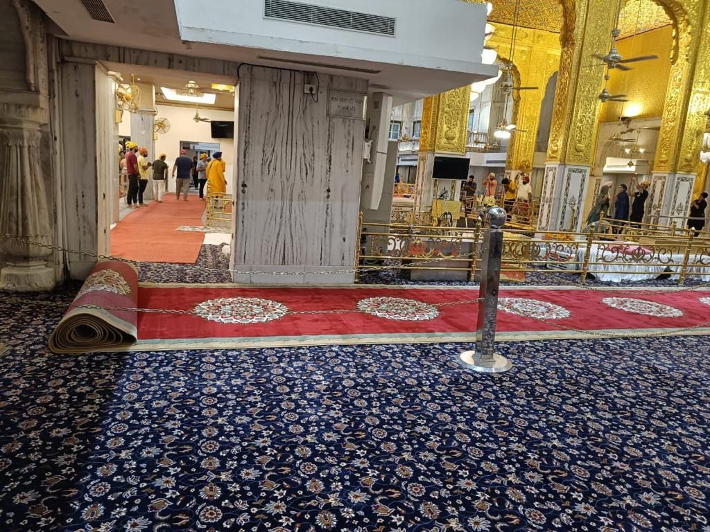 Gurudwara Corridor Blue Floral Carpet Installation by MR Enterprises Panipat