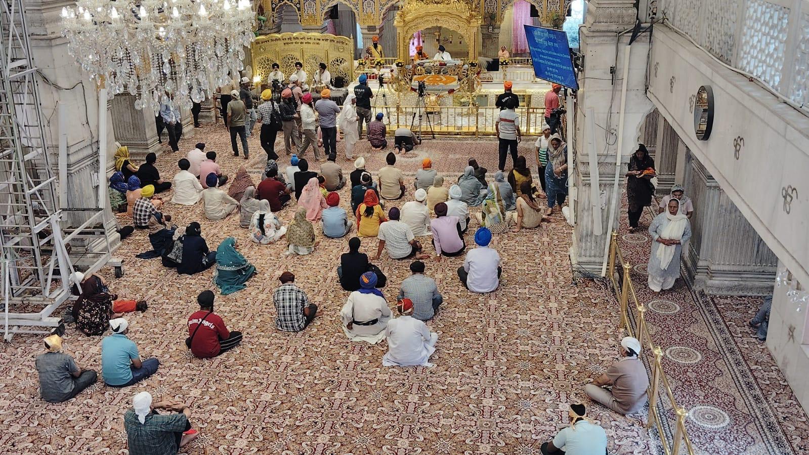 Large Gurudwara Darbar Hall Cream Floral Carpet Packed With Devotees MR Enterprises